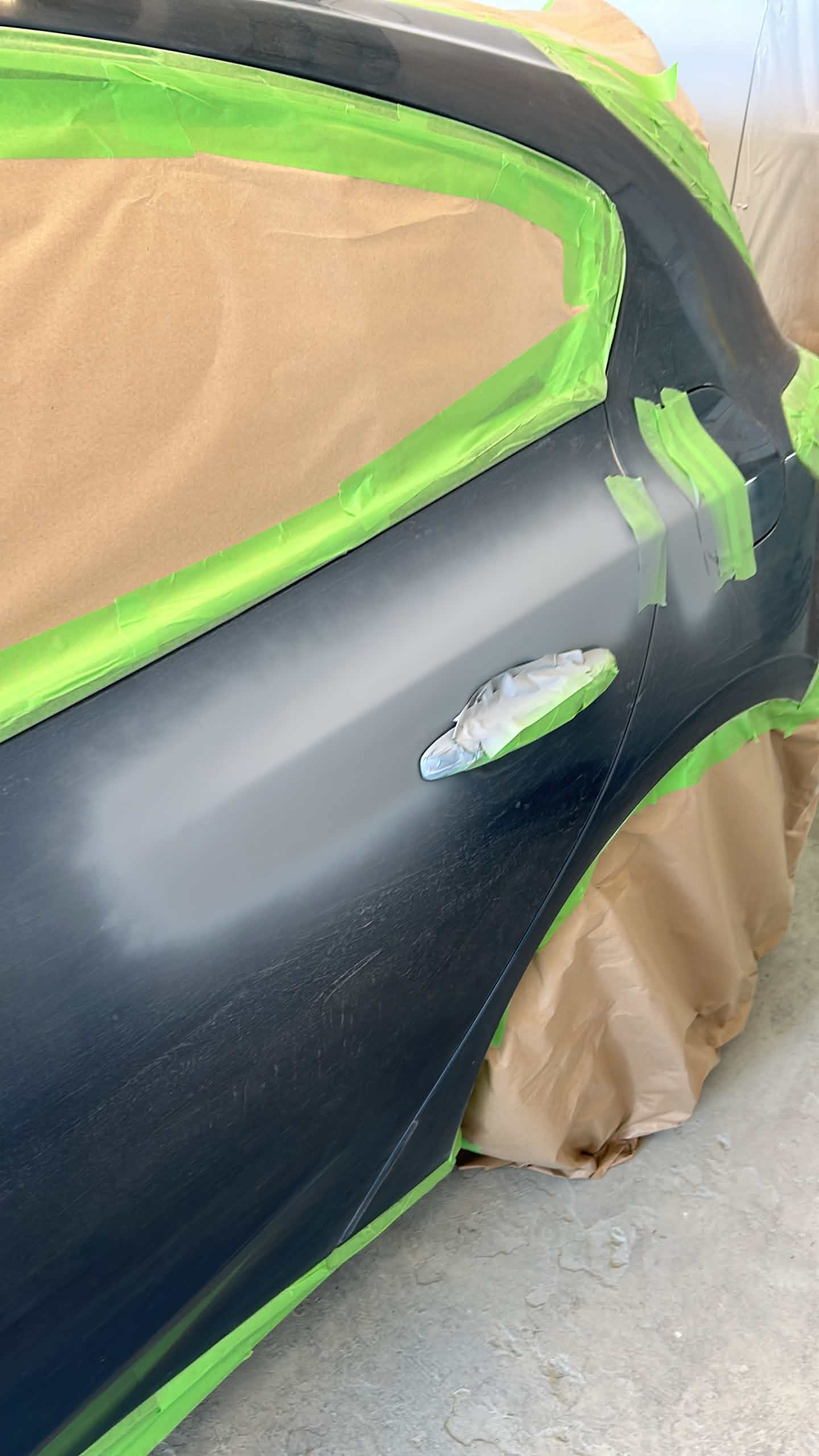 Car masked and prepped ahead of respray