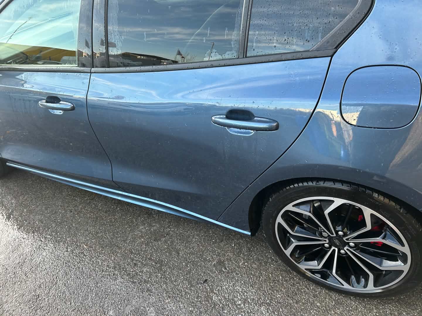 Repaired car, door and rear panel finished