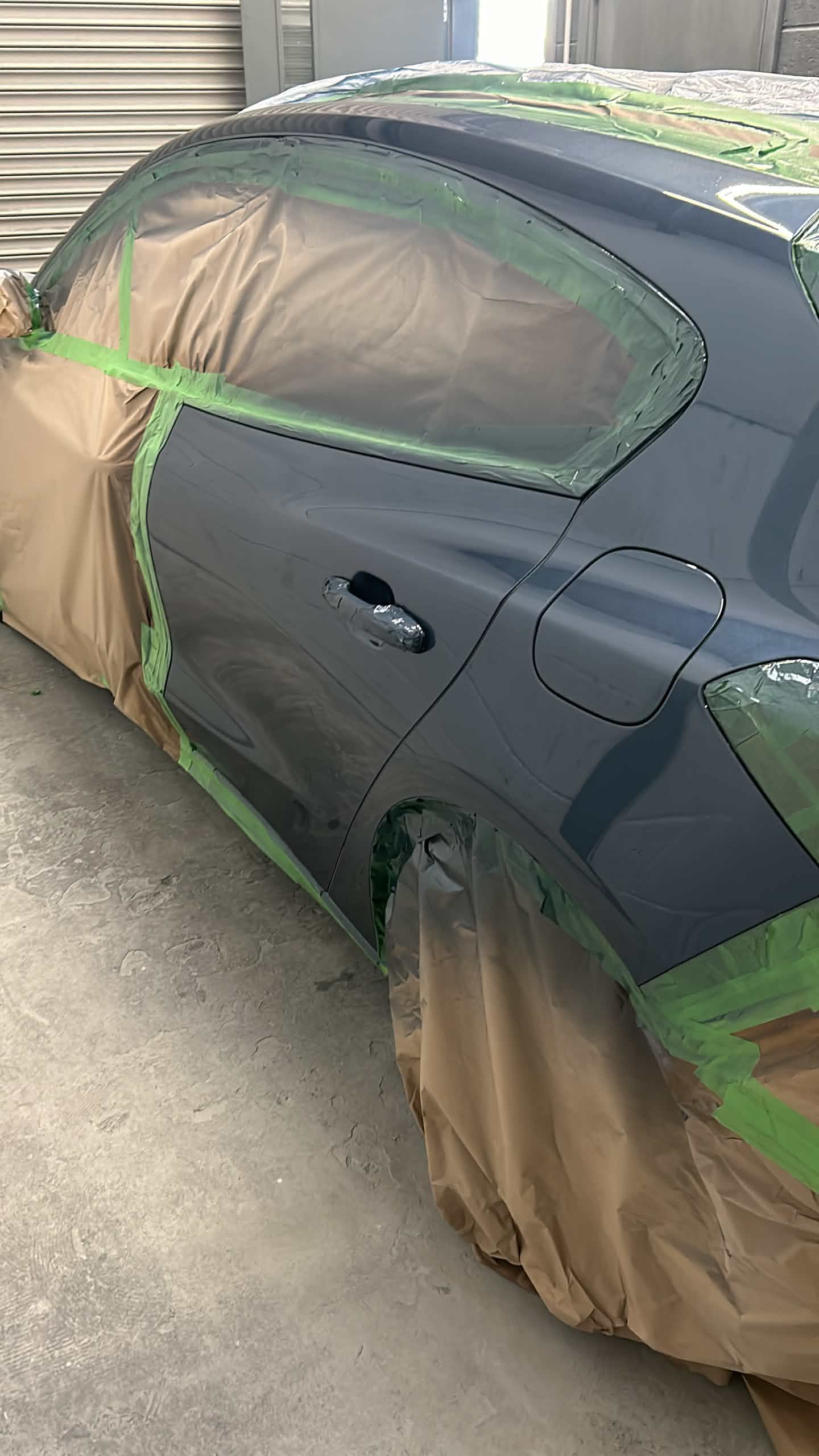 Car door masked ahead of paint repair