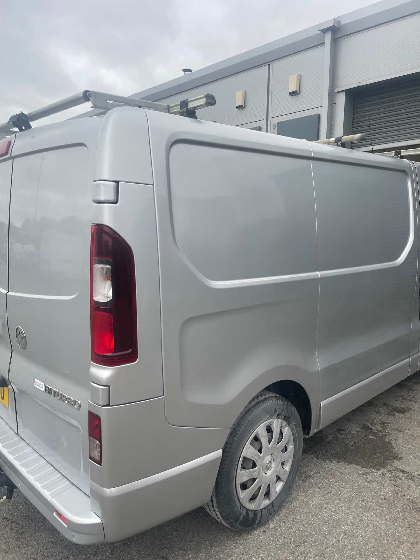 Silver van side panel and roof rack